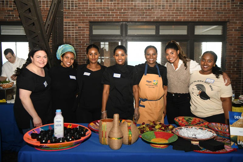 Group of chefs behind table