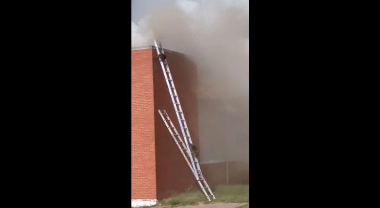 The South Bend Fire Department rescued a couple of raccoons Monday that were trapped on top of a burning warehouse in northern Indiana.