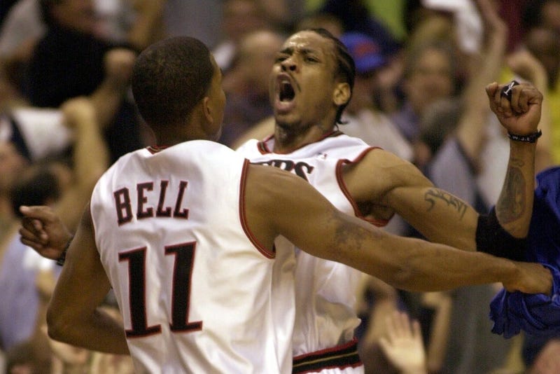 Sixer Allen Iverson does a chest slam with Raja Bell during Game 7 of the NBA Eastern Conference Finals at the First Union Center in Philadelphia, Pennsylvania Sunday June 3, 2001.