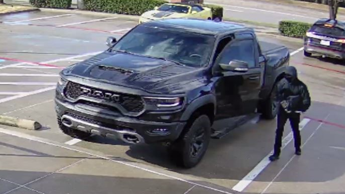 Flower Mound police circulate photos of a bank robber and his vehicle