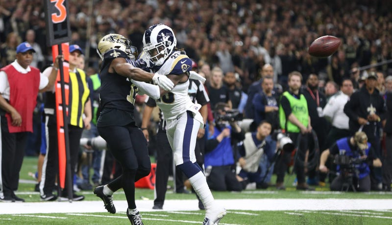 Rams defensive back Nickell Robey-Coleman (23) breaks up a pass intended for Saints receiver Tommylee Lewis (11). The NFL later admitted there should've been defensive pass interference on the play.