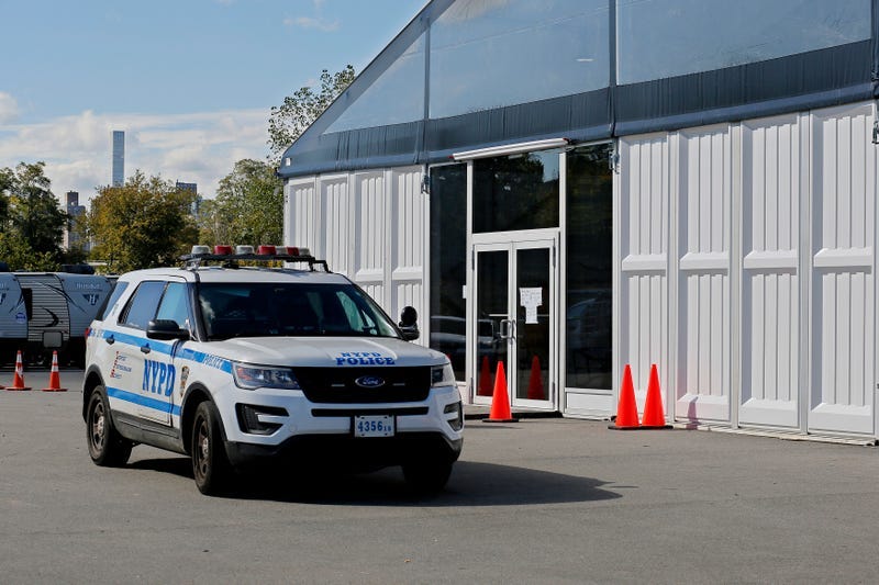 A police car stands guard at the humanitarian relief center on Randall's Island on Oct. 19, 2022 in New York City.