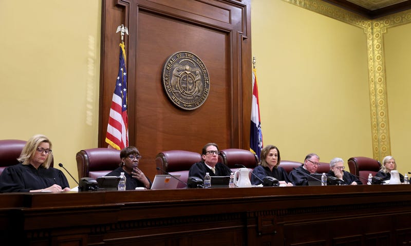 The Missouri Supreme Court takes the bench on Sept. 10, 2024, in Jefferson City to hear a case questioning whether an amendment to overturn the state’s abortion ban will remain on the state’s November ballot. From left are Judges Kelly C. Broniec, Robin Ransom, W. Brent Powell, Chief Justice Mary R. Russell, Zel. M. Fischer, Paul C. Wilson and Ginger K. Gooch.