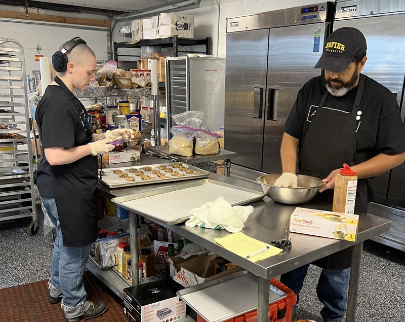 Al's Cookie Mixx employee Cy with Chief Cookie Operator -- and co-owner -- Alvin Green.