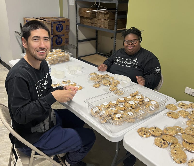 Al's Cookie Mixx employees Tommy and Jasmine at work.