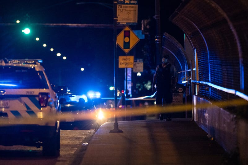Chicago police investigate the scene where 3 people were shot in the 7900 block of South Wabash, in the Chatham neighborhood, Tuesday, July 14, 2020. 