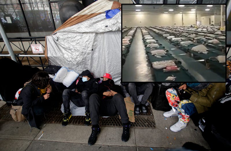 Migrants camp out in front of the Watson Hotel after being evicted on January 30, 2023 in New York City. Migrants who have been staying at the Watson Hotel since arriving to NYC were evicted over the weekend to be relocated to the recently opened up migrant relief center for single adult men at the Brooklyn Cruise Terminal. The ones who refused have been camping out in front of the hotel since eviction. Several migrants who agreed to the relocation returned, complaining of lack of heat and bathroom space.