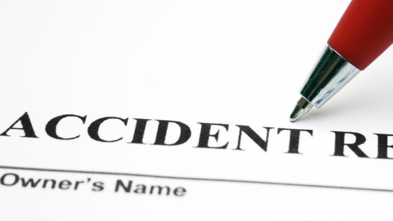 Close up of pen on accident report