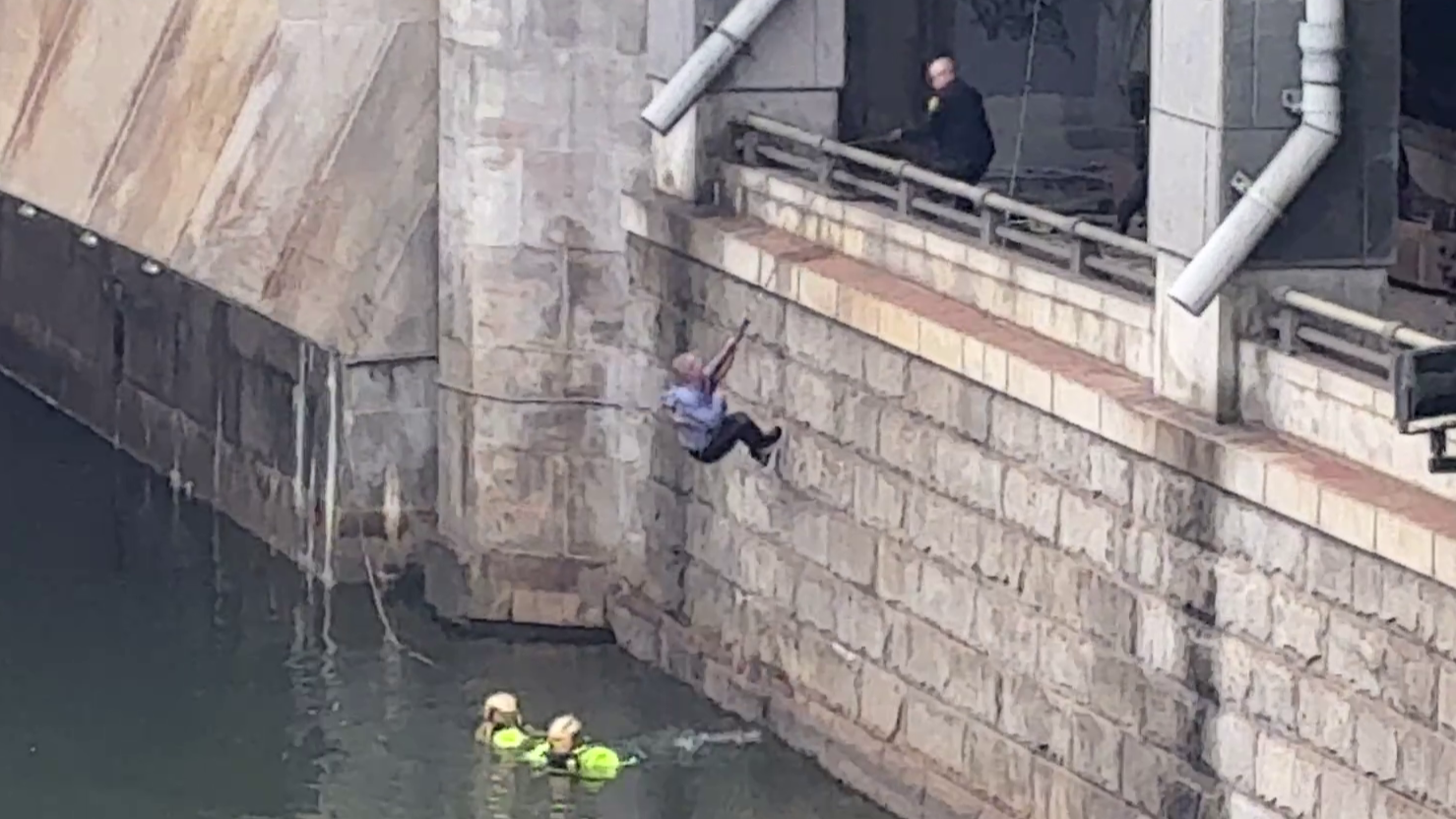 Firefighters pull person out of the Schuylkill River in daytime rescue
