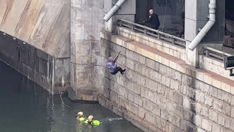 First responders rescue a person from the Schuykill River.