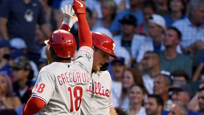 Philadelphia Phillies shortstop Didi Gregorius celebrates with first baseman Rhys Hoskins