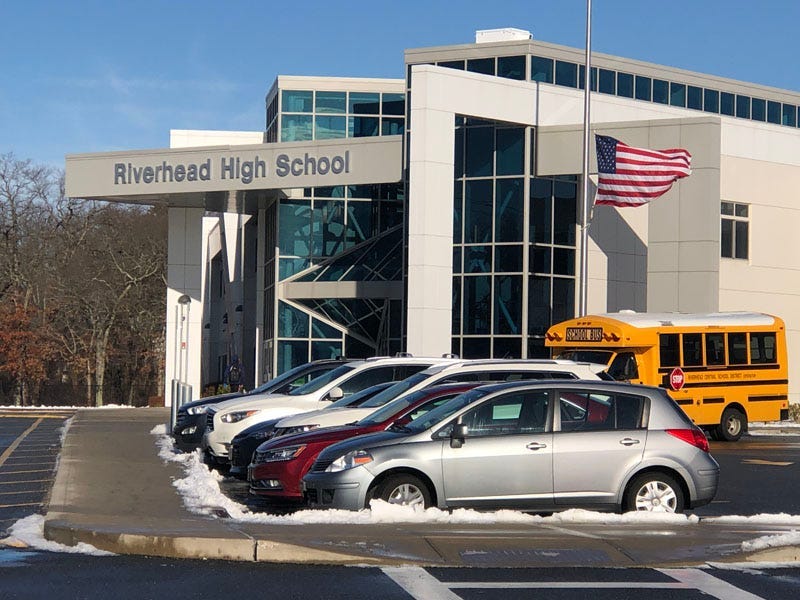 Flag at half staff outside Riverhead High School