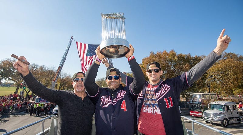Washington Nationals players and coaches roll through the streets of Washington, D.C. and then speak on stage, celebrating their 2019 World Series championship with a few hundred thousand fans on November 2, 2019. 