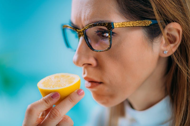Woman Smelling 