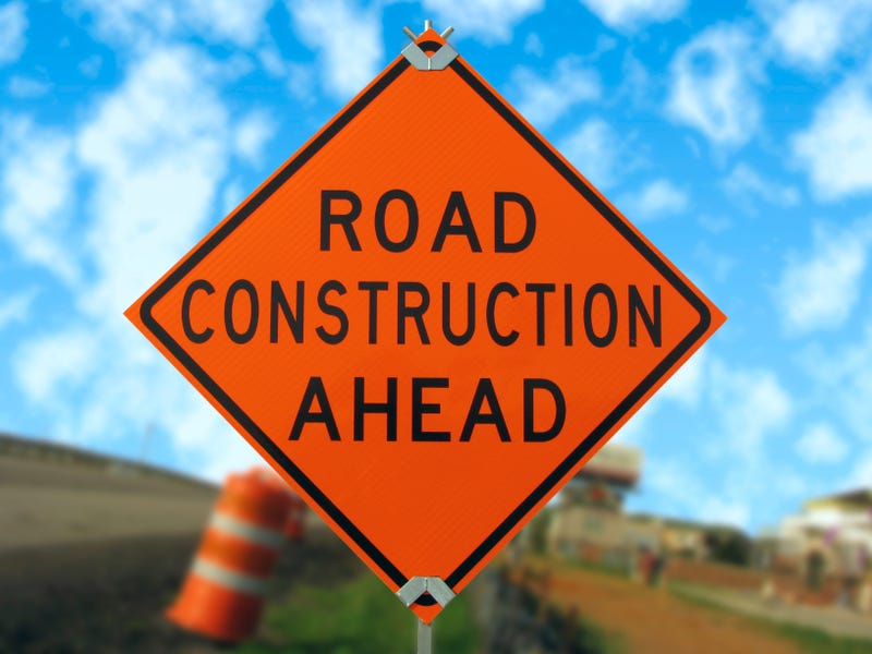 Road construction ahead traffic sign