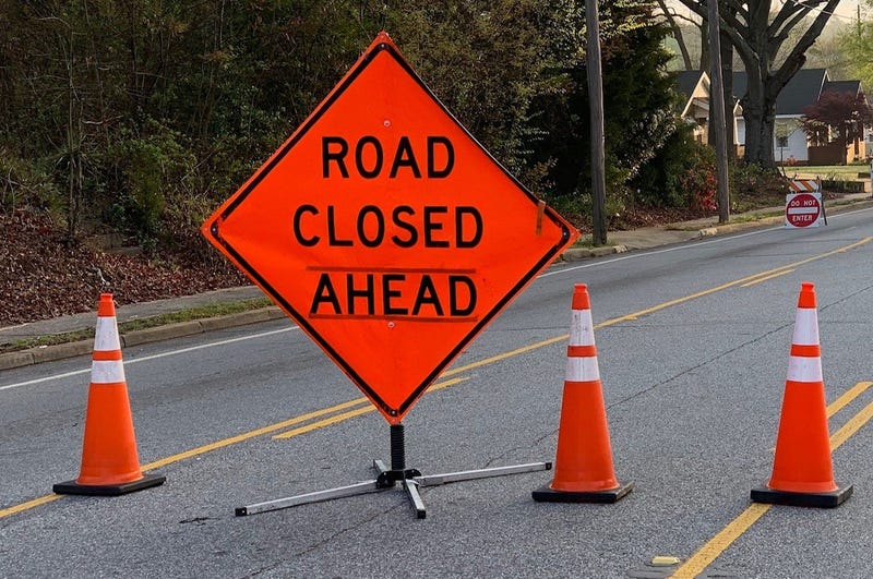 Road Closed Ahead sign
