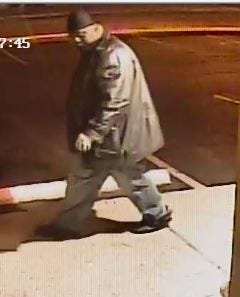 Surveillance snapshot of robbery suspect from 3-17-20