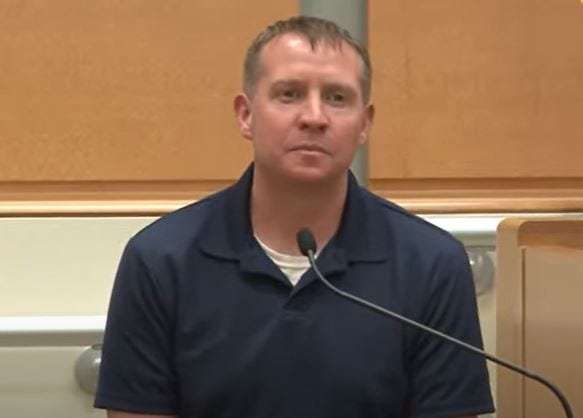 Robbie Parker, father of Emilie Parker, a child killed in the 2012 Sandy Hook shooting; he took the stand, describing persistent abuse by people repeating Alex Jones' lies about the attack, 9/29/22