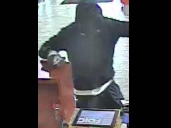 suspect with gun at bank