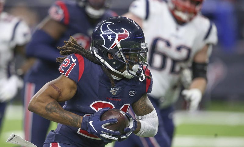 Bradley Roby returns an interception in the first quarter against the Patriots