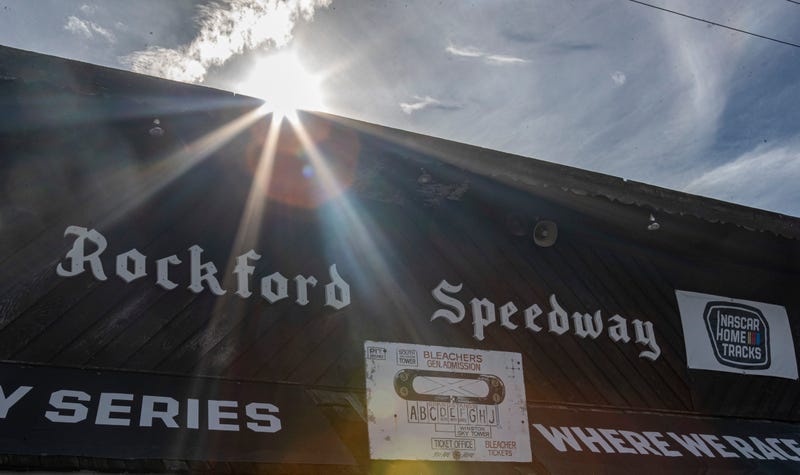 speedway entrance with sun over the roof