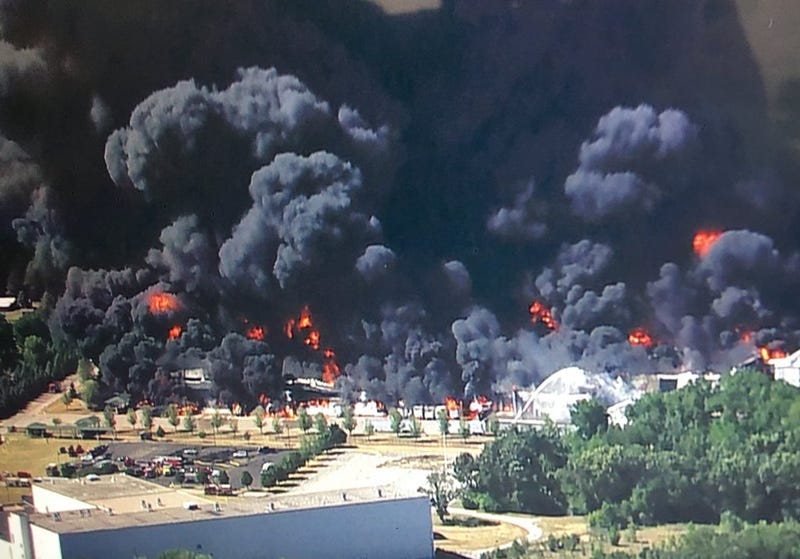 A massive chemical plant fire that sent black plumes of smoke into the air near the Illinois-Wisconsin border is expected to continue burning for several days as firefighters retreat and residents were ordered to evacuate.