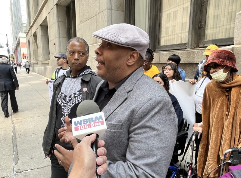 housing activists outside City Hall