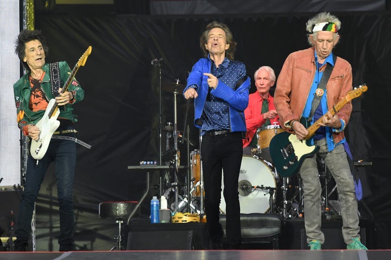 Ronnie Wood, Mick Jagger, Charlie Watts and Keith Richards of The Rolling Stones perform on stage