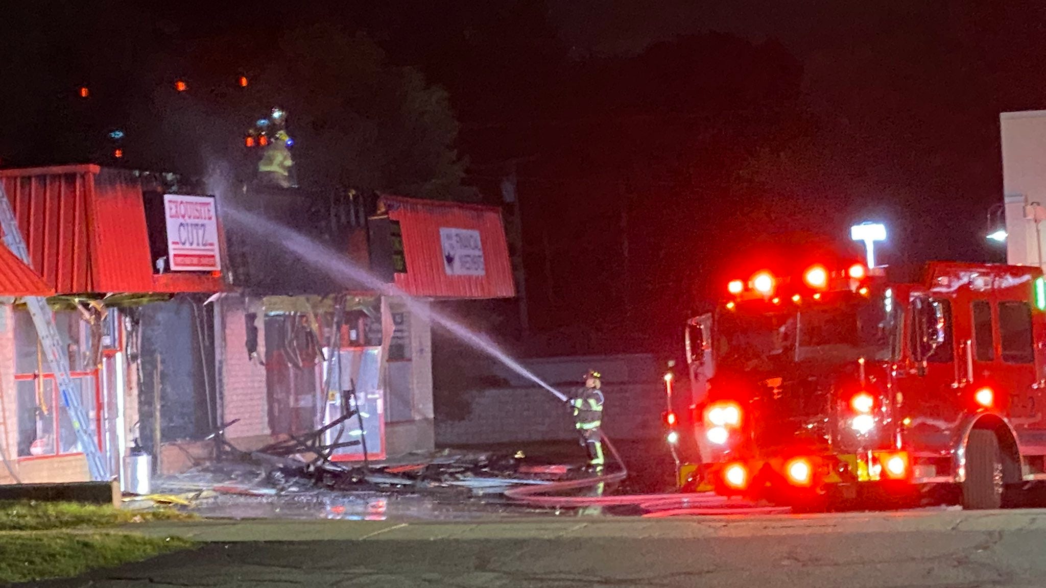 Chief says fire 'suspicious' after firefighters subdue morning blaze that ripped through Romulus strip mall