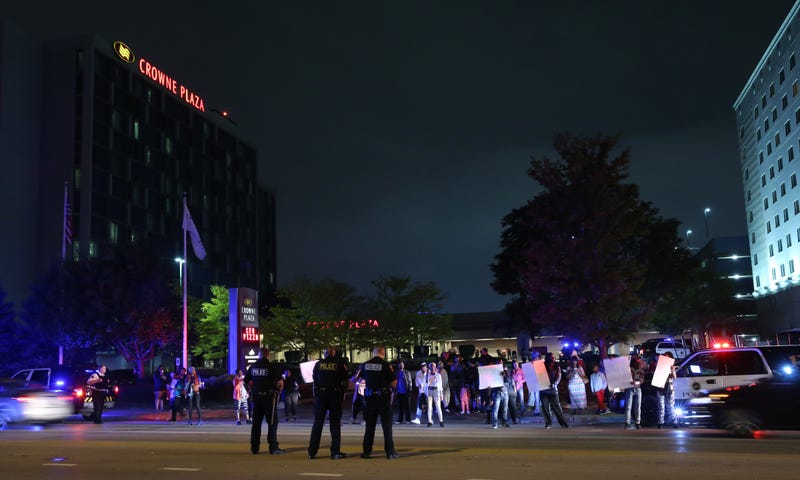 Rosemont hotel with police and crowds in 2017