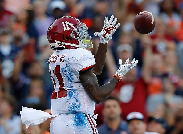 Henry Ruggs hauls in a pass for Alabama. 