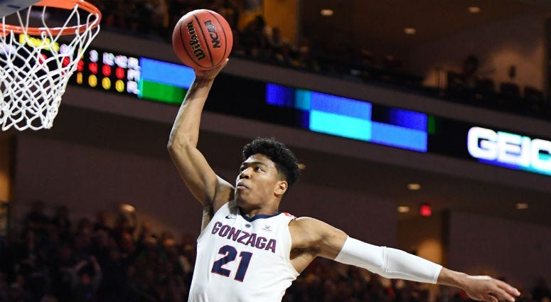 Gonzaga's Rui Hachimura dunks on the Saint Mary's Gaels during the championship game of the West Coast Conference basketball tournament