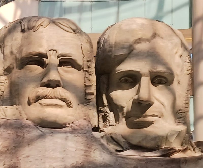 The South Dakota Department of Tourism has placed a model of Mt. Rushmore in an ice skating rink in Dallas. 