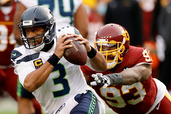 Russell Wilson under pressure.