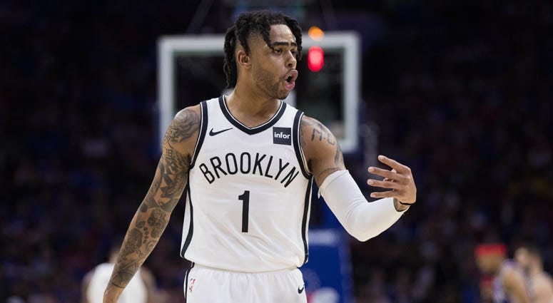 The Nets' D'Angelo Russell reacts to his bench during a break in the second quarter against the 76ers in Game 1 of their first-round playoff game at Wells Fargo Center in Philadelphia.