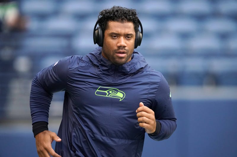 Russell Wilson jogs before a Seahawks game. 
