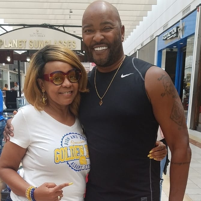 Atlanta radio legend Ryan Cameron, shown with Radio.com's Maria Boynton during a Ryan Cameron Foundation Health Fair, says he has a long recovery following emergency surgery