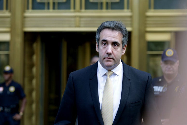 Federal prosecutors have charged an analyst with the Internal Revenue Service with illegally disclosing confidential reports about Michael Cohen's bank records that revealed that President Donald Trump's former lawyer sought to profit from his proximity t