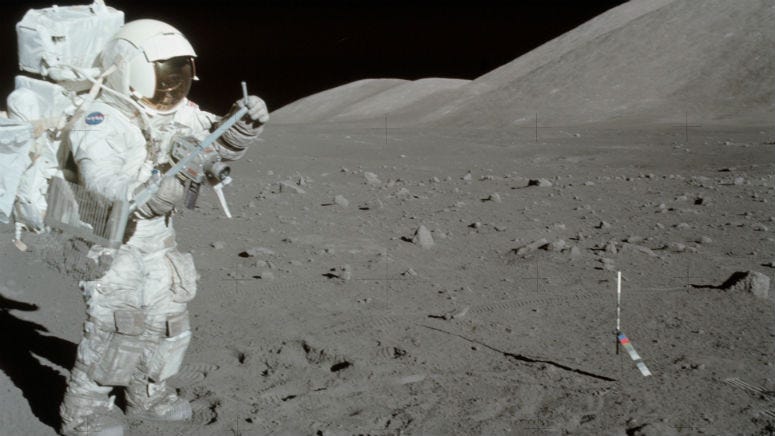 Harrison Schmitt collects lunar rake samples during the first Apollo 17 extravehicular activity.
