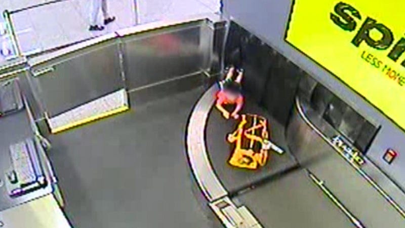 Child Stuck In Baggage Belt
