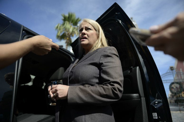 Justice Secretary Wanda Vazquez Garced, speaking with reporters in 2018.