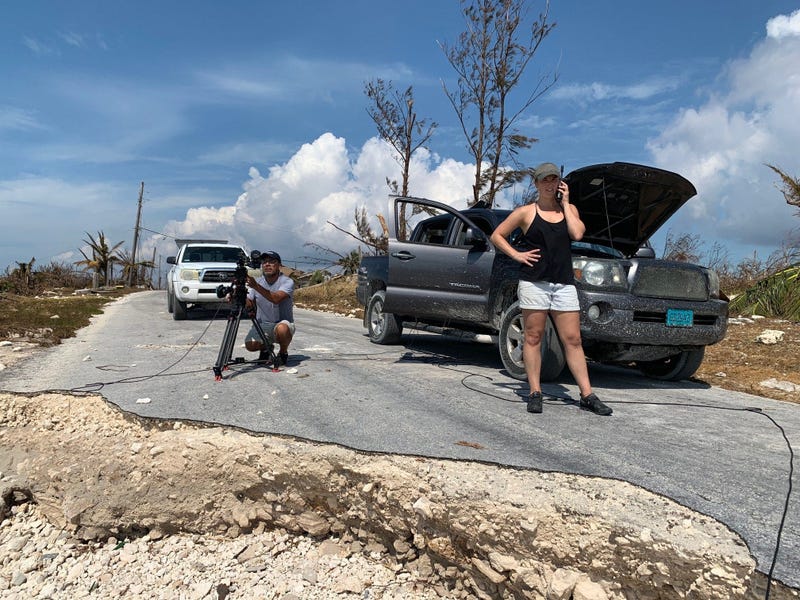 CNN producer Jaide Timm-Garcia and photojournalist Jose Armijo set up for a liveshot from the hard hit town of High Rock in Grand Bahama Island.