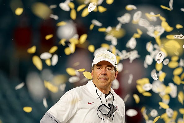 Nick Saban celebrates winning a national title.