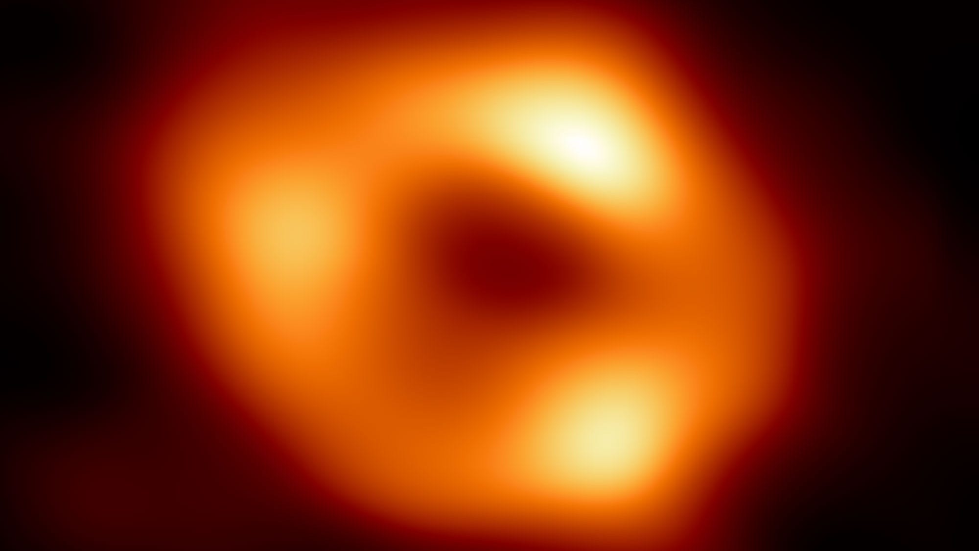 Astronomers reveal first image of black hole at the center of our galaxy