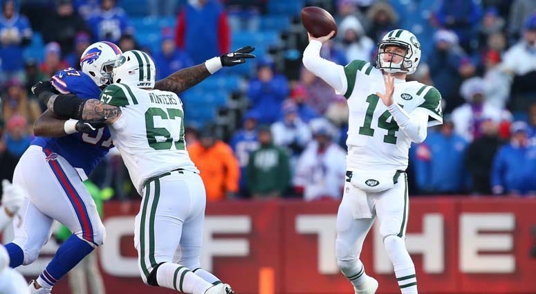 Oct 28, 2018; Chicago, IL, USA; New York Jets quarterback Sam Darnold (14) warms up before the game against the Chicago Bears at Soldier Field. Mandatory Credit: Quinn Harris-USA TODAY Sports