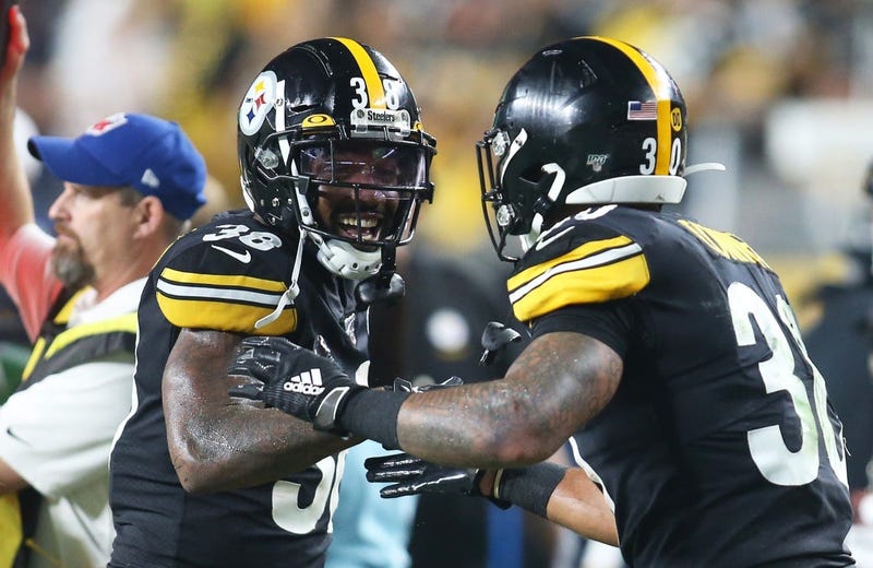 Pittsburgh Steelers running back Jaylen Samuels (38) congratulates running back James Conner (30) on his touchdown against the Cincinnati Bengals during the second quarter at Heinz Field.