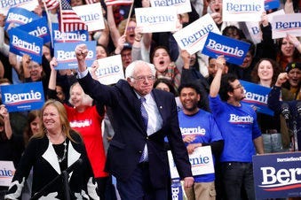 Democratic presidential candidate Sen. Bernie Sanders, I-Vt., with his wife Jane O'Meara Sanders, arrives to speak to supporters at a primary night election rally in Manchester, N.H., Tuesday, Feb. 11, 2020. (AP Photo/Pablo Martinez Monsivais)