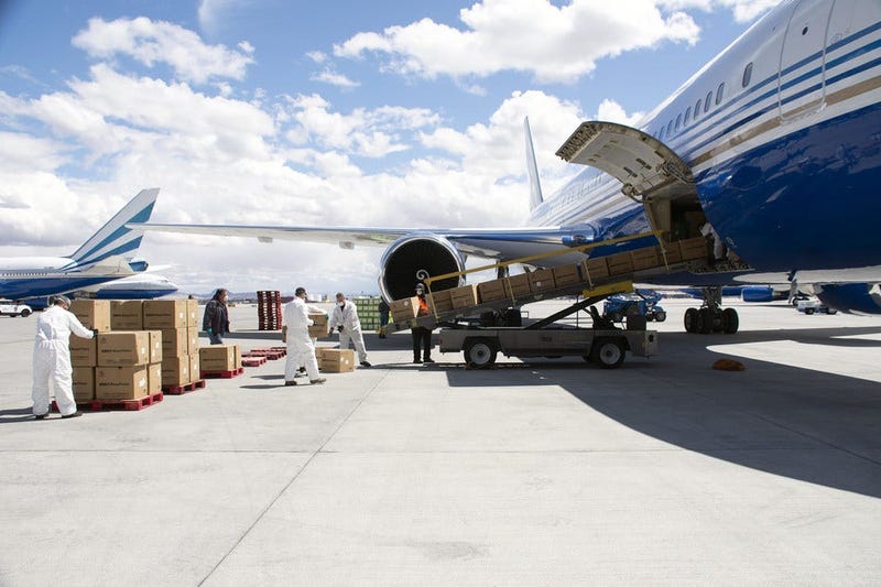 Plane carrying medical masks unloading at McCarran International Airport