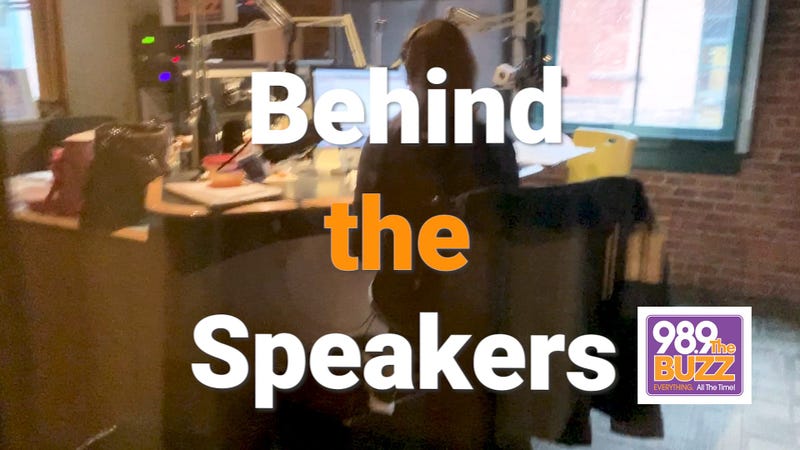 Behind the Speakers