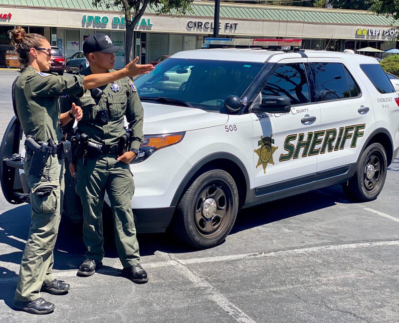Santa Clara County Sheriff's Office Field Training Officer (FTO) Romero is mentoring Deputy Bunal after a call for service.